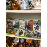 Shelf of Xbox 360 games .