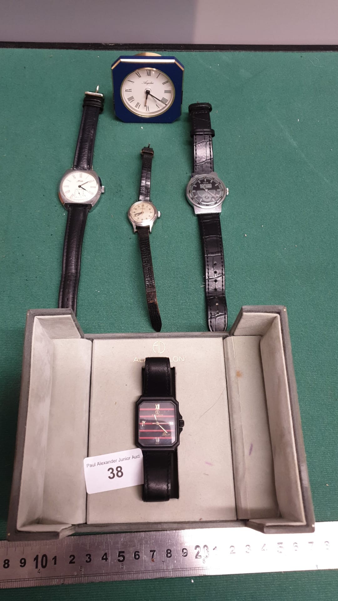 Lot of watches includes Alan delon.