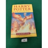 First edition j k Rowling Harry Potter and the order of the Phoenix book .