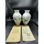 Pair of Franklin mint the woodland vases with certificate s .
