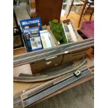 Large box of train tracking , building accessories etc .