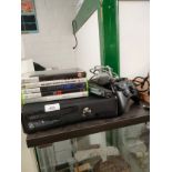 Xbox 360 console with controller and power supply and games .