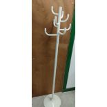 Large modern contemporary coat stand in metal with white finish.