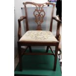 Georgian beautiful arm chair with upholstery set with flower design .