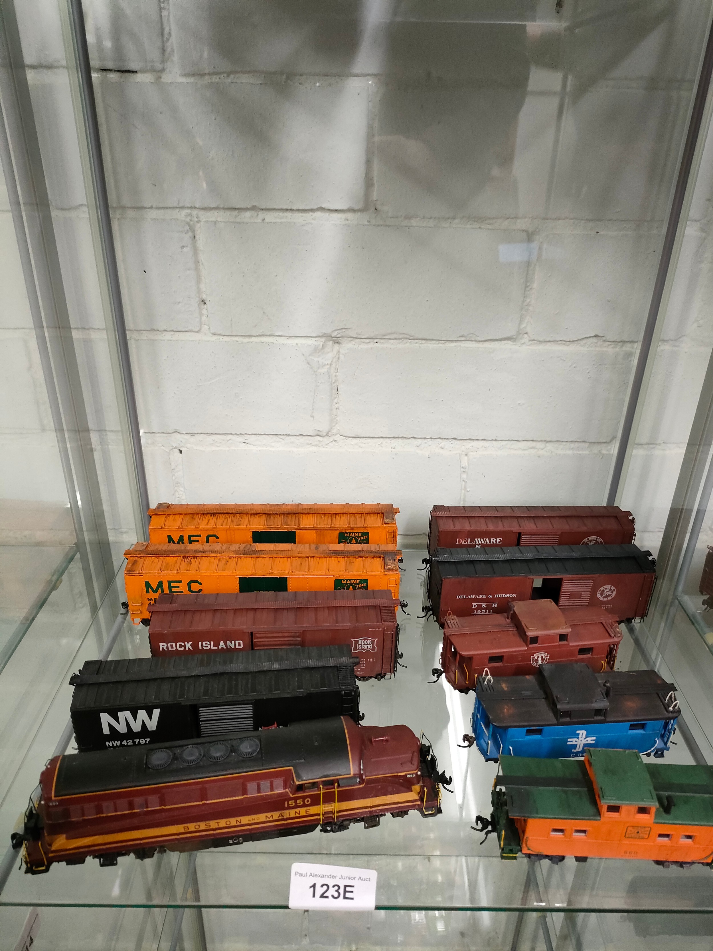 Boston and Maine 1550 train model together with rolling carriages.