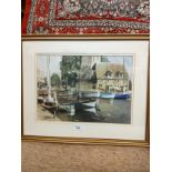 Water colour of harbour scene signed Murray Easton fitted in gilt framing .