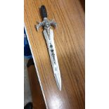 Ornate style dagger .