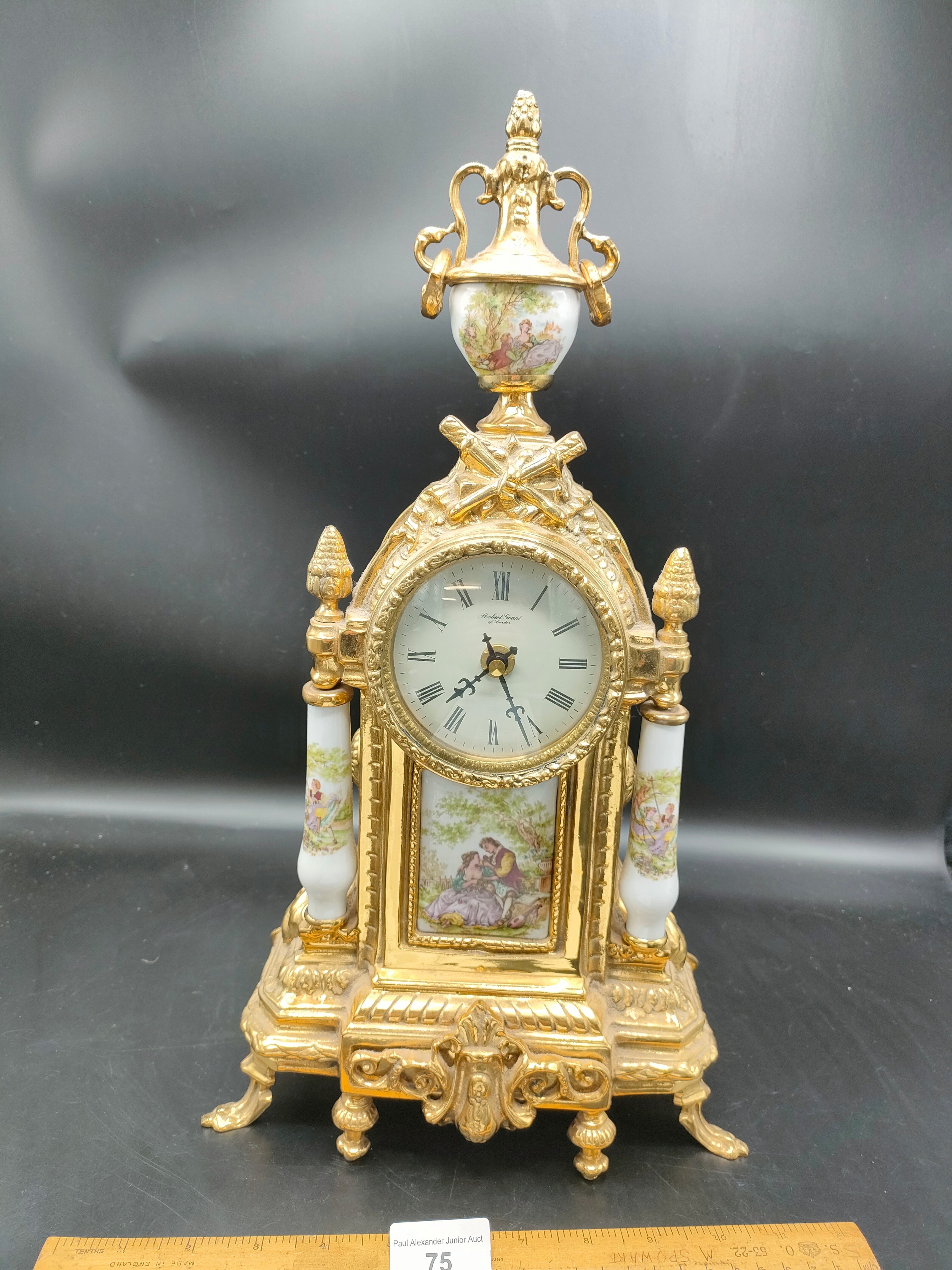 Large brass Robert grant of London battery operated clock .