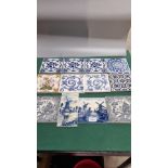 Lot of collectable tiles includes delft dutch tiles etc .