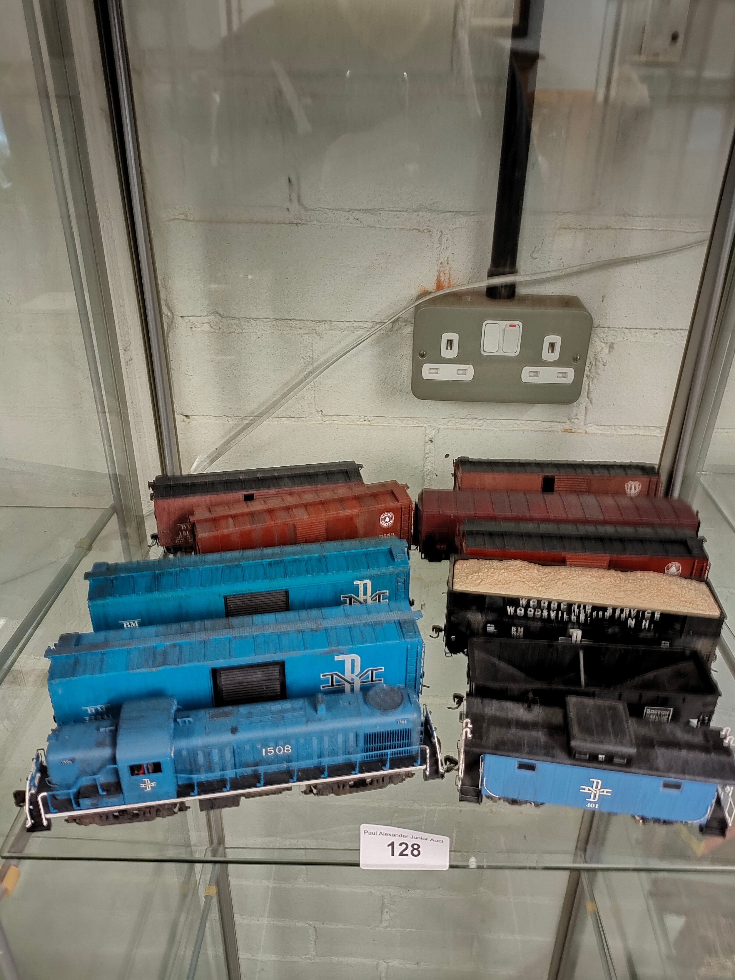 Canadian train model together with lot of rolling carriages .