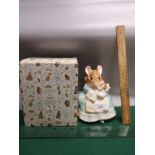 Large border fine arts hunca munca and baby figure with box .