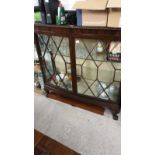 Large 1900s China cabinet with key .