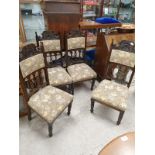 Set of 4 Victorian high backed chairs with a ornate design .