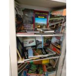 3 shelfs of British train books etc .