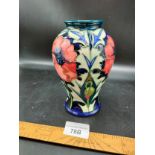 Moorcroft vase in flower and blue design.