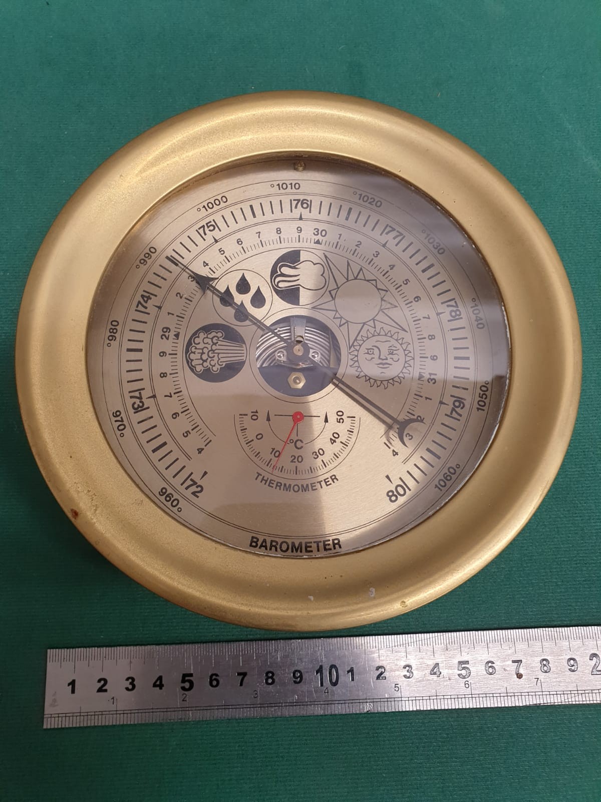 Heavy ornate brass Barometer thermometer.