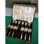 Silver plated spoon and tong set in fitted case.