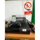 Xbox 360 console with games and power supply.