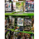 Shelf of Xbox 360 games .