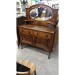 Antique mirrored back arts and crafts dresser.