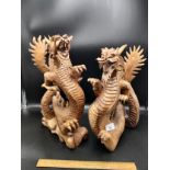 Pair of large old oriental carved wooden dragon s figures.