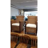 Pair of retro style conservatory chairs with rattan design.