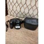 Fujifilm S1000 camera with case .