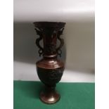 Large early Oriental bronzed vase with dragon foliage.