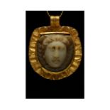 ROMAN CAMEO STONE IN A GOLD PENDANT