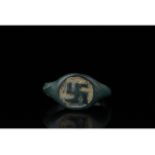 VIKING ERA BRONZE RING WITH SWASTIKA PATTERN