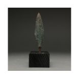 ANCIENT BRONZE SPEAR HEAD ON STAND