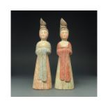 CHINA, TANG DYANSTY PAIR OF POTTERY STANDING LADIES