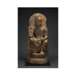 GIANT GANDHARA SHIST STONE FIGURE OF SEATED BODHISATTVA