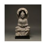 GANDHARA SCHIST STONE FIGURE OF SEATED BUDDHA