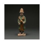 CHINA, MING DYNASTY GLAZED POTTERY FIGURE