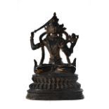 CHINESE BRONZE SEATED GUANYIN WITH SWORD