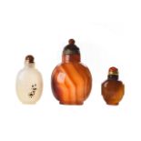 COLLECTION OF THREE CHINESE AGATE AND JADE SNUFF BOTTLES