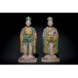 CHINESE MING DYNASTY GLAZED POTTERY PAIR OF ASTROLOGICAL FIGURES