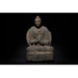 RARE GANDHARA GOLD GILDED SCHIST STONE FIGURE OF SEATED BUDDHA