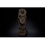 LARGE GANDHARA SCHIST STONE FIGURE OF STANDING BUDDHA