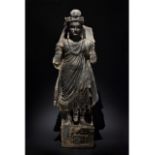 HUGE GANDHARA SCHIST STONE FIGURE OF STANDING BODHISATTVA