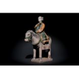 CHINESE MING DYNASTY GLAZED POTTERY HORSE AND RIDER FIGURE