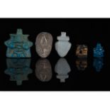 EGYPTIAN GROUP OF AMULETS AND A HEAD OF PTAH