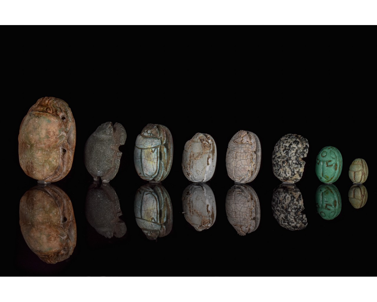 EGYPTIAN GROUP OF EIGHT SCARABS