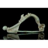 ROMAN TRUMPET HEADED BOW BROOCH WITH DUCK