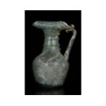 ROMAN GLASS JUG WITH HANDLE AND TRAIL