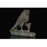 EGYPTIAN STATUETTE OF A FALCON AND A SNAKE