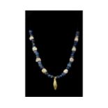 ROMAN GLASS AND GOLD NECKLACE â€“ WEARABLE