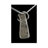 MEDIEVAL SILVER AXE-SHAPED PENDANT