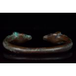 BRONZE BRACELET WITH RAMS HEAD TERMINALS